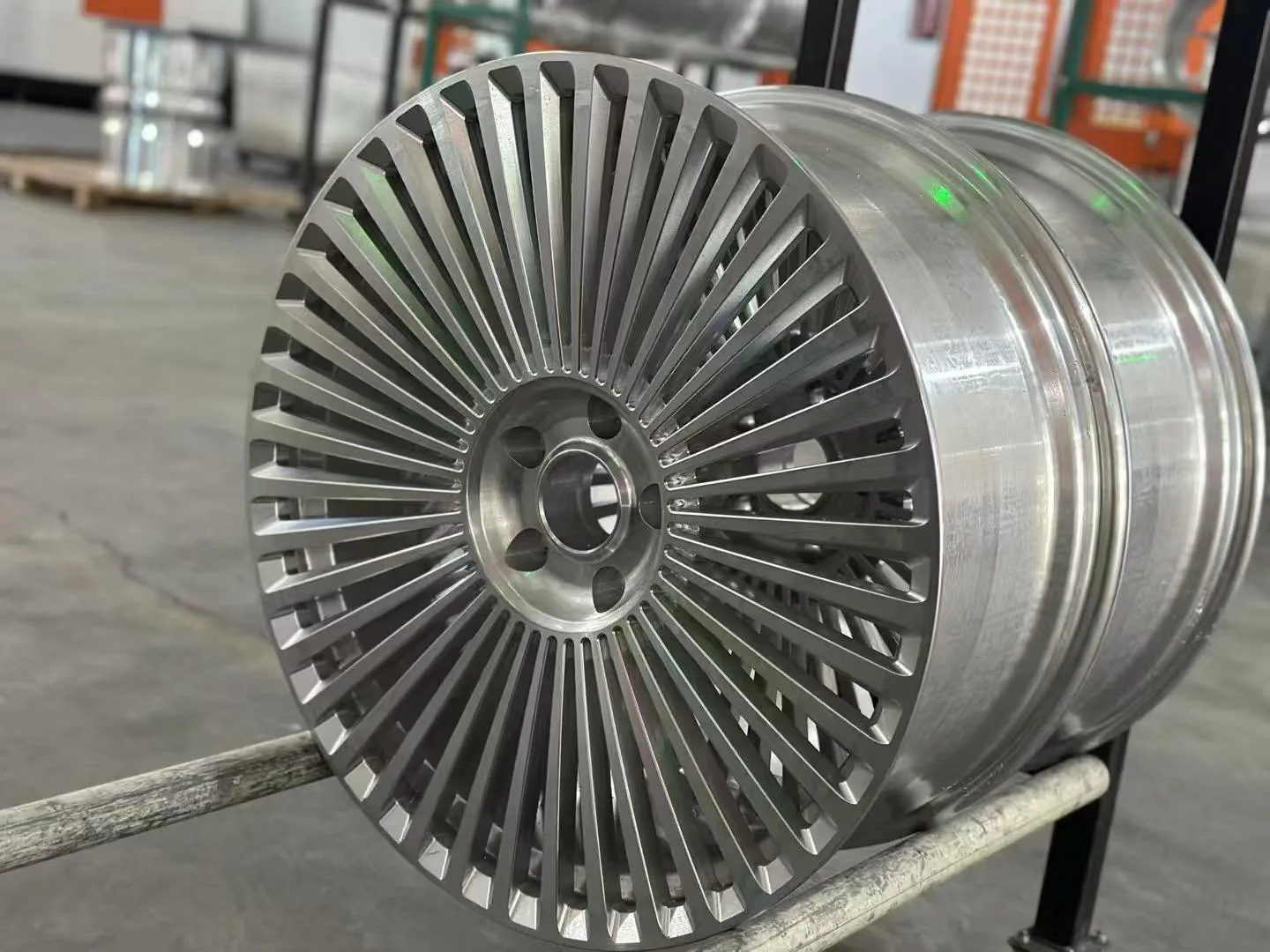 Fine-spoke detail at a partner wheel production facility