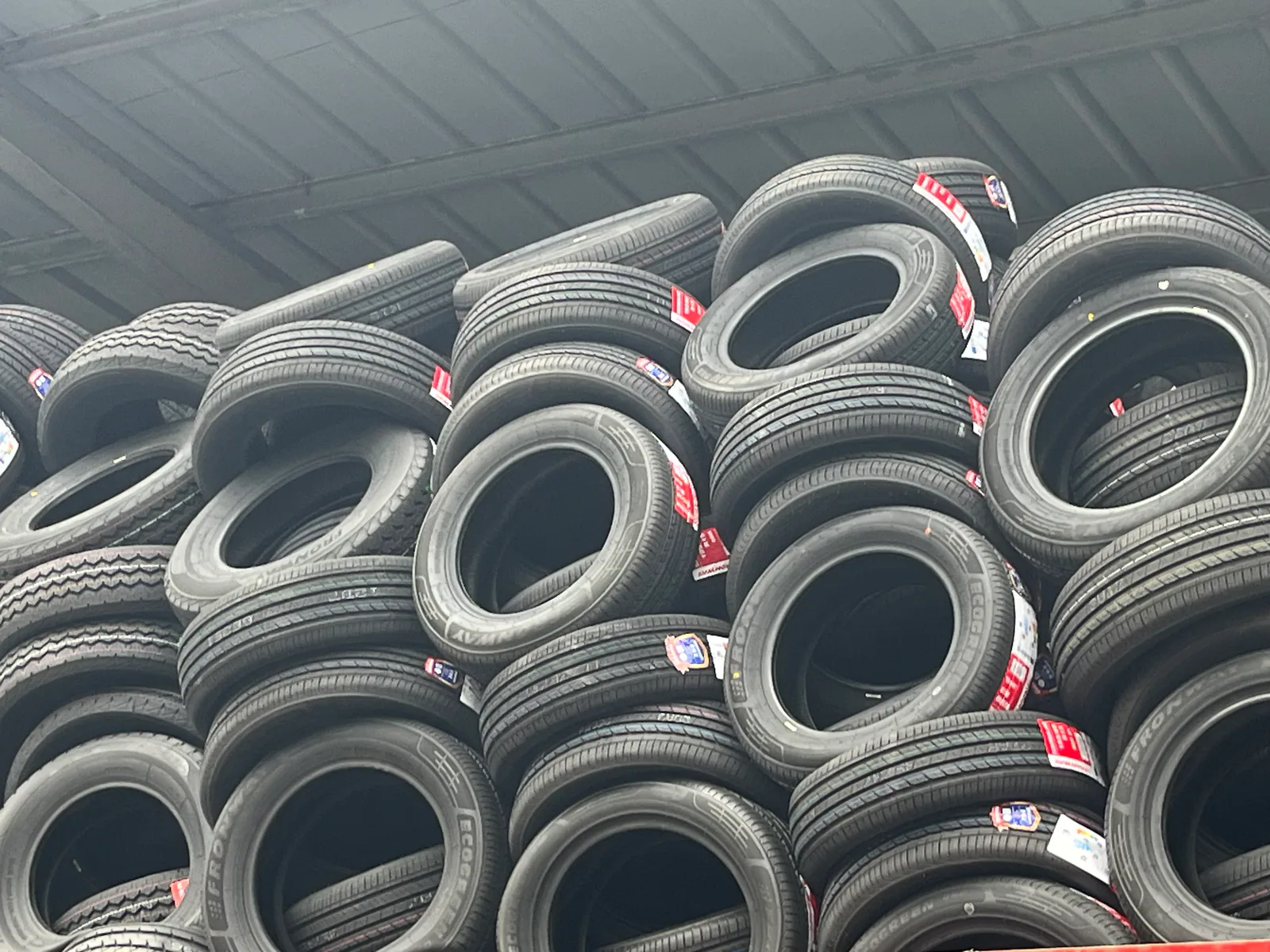 New tires photographed in a Peter-owned supply setting