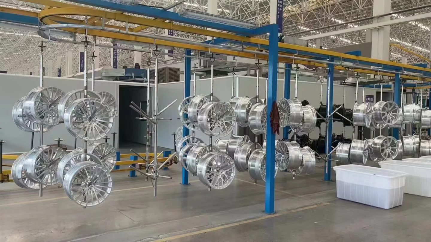 Forged wheels on a finishing line at a partner production facility