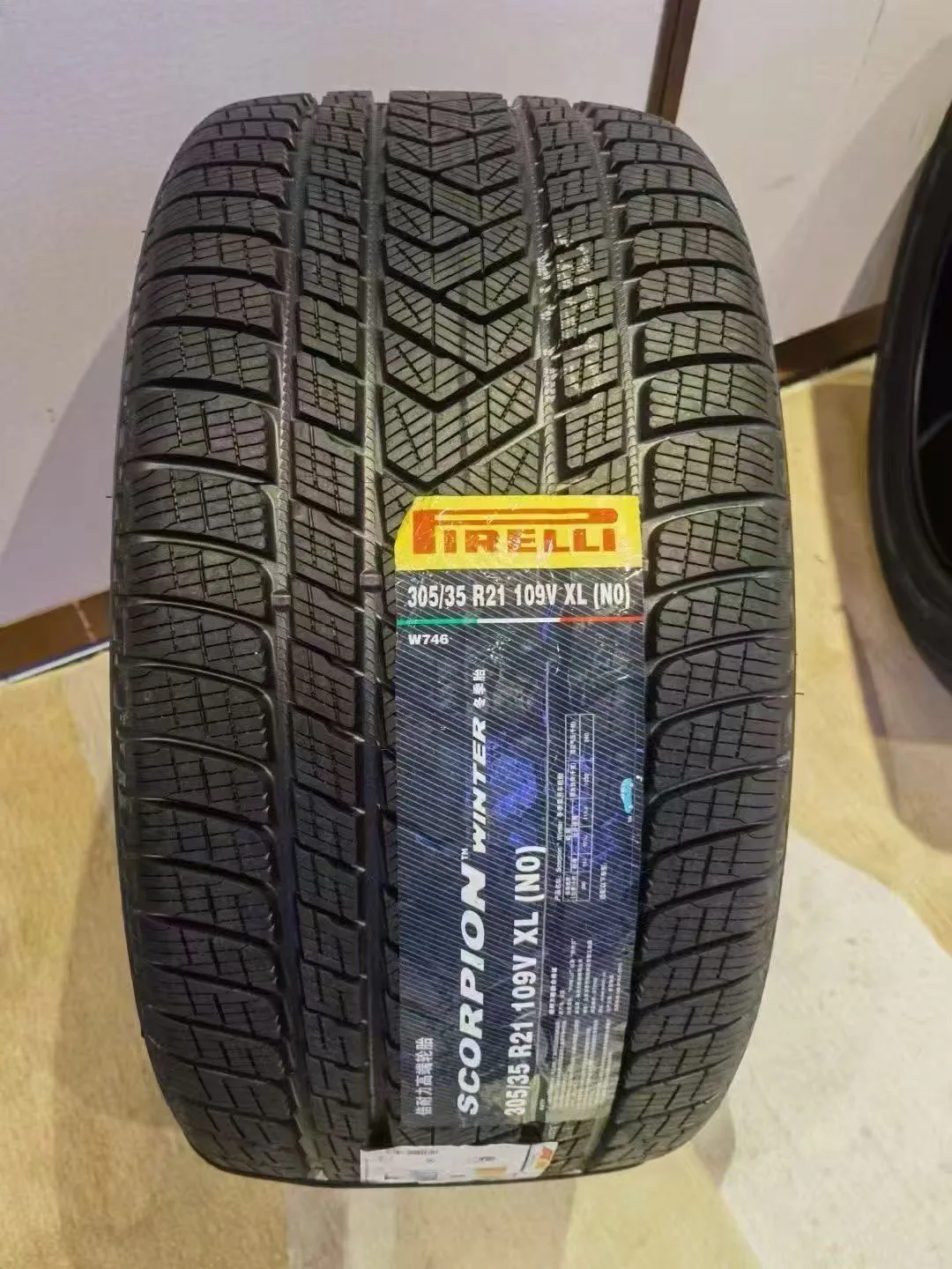 New winter tire showing a directional tread pattern